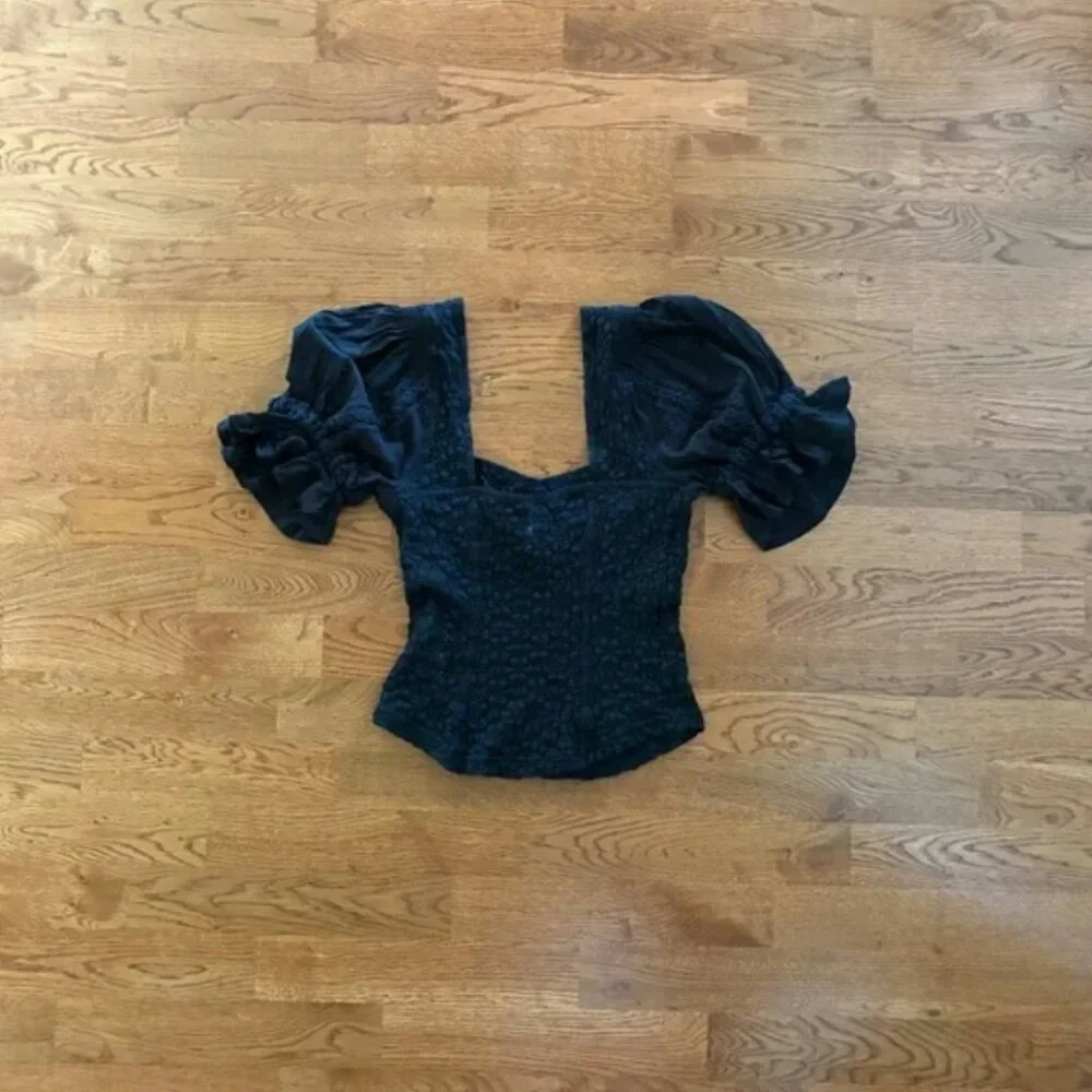 free people spring fling black blouse peasant puff sleeve sweetheart neck lace